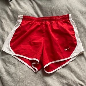 Red Nike shorts